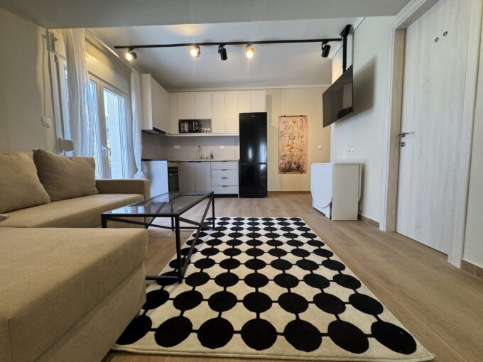 Furnished living room and kitchen in a renovated apartment near Thessaloniki seafront