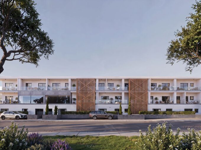 Exterior rendering of Oasis Residences Golden Visa apartments in Bournazi, Peristeri, with glass balconies