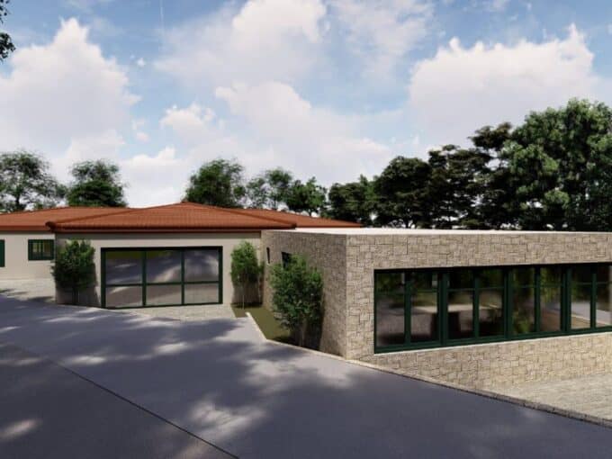 Exterior design rendering of ground-floor Golden Visa apartments in Aegina with tiled roofs and stone facades