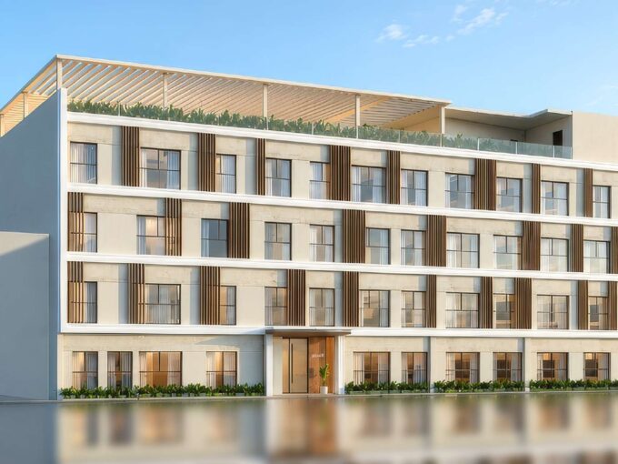 Exterior rendering of Serenity Golden Visa apartments in Piraeus with balconies and rooftop leisure space