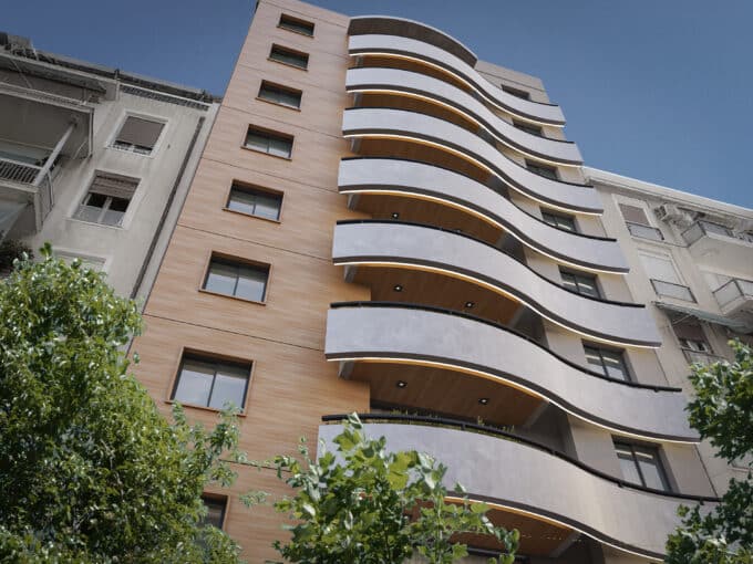 Exterior rendering of Acropolis Heights Golden Visa studios in Patisia, Athens, with curved balconies